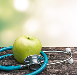 photo of an apple with a stethoscope